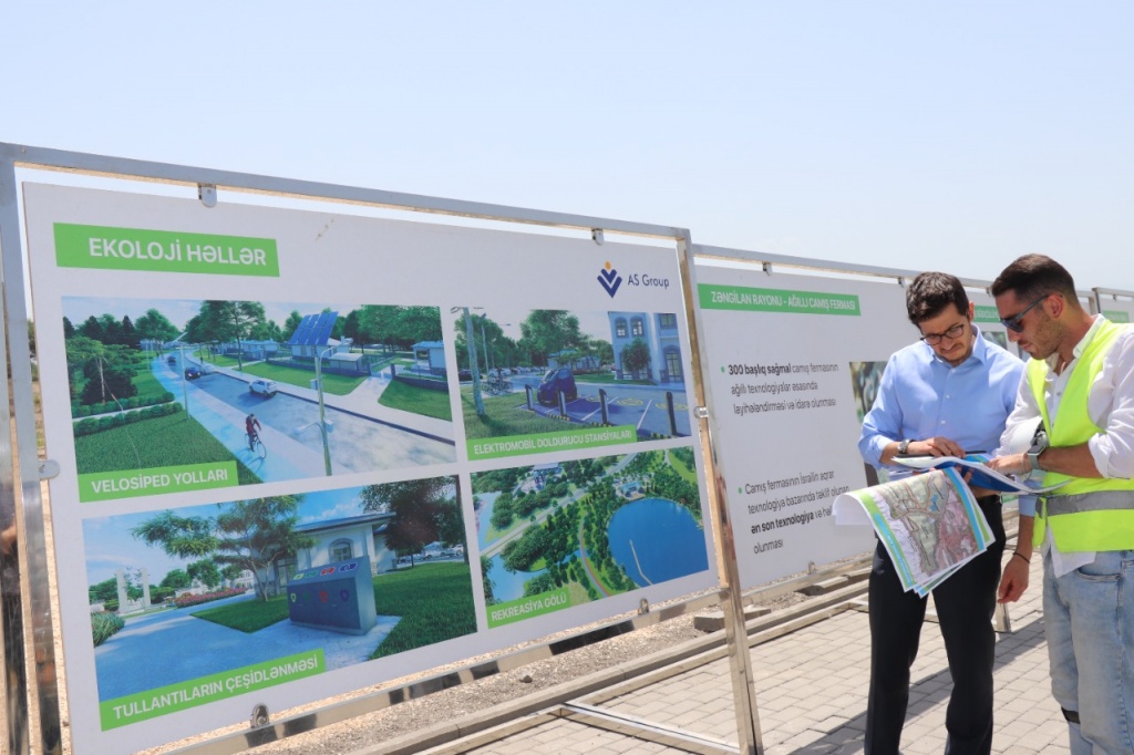 George-Deek-left-with-chief-engineer-of-smart-city-Aghali-in-Zangilan-in-Karabakh-region-in-south-of-the-country-less-than-3km-from-the-border-with-Iran-June-2021.jpeg