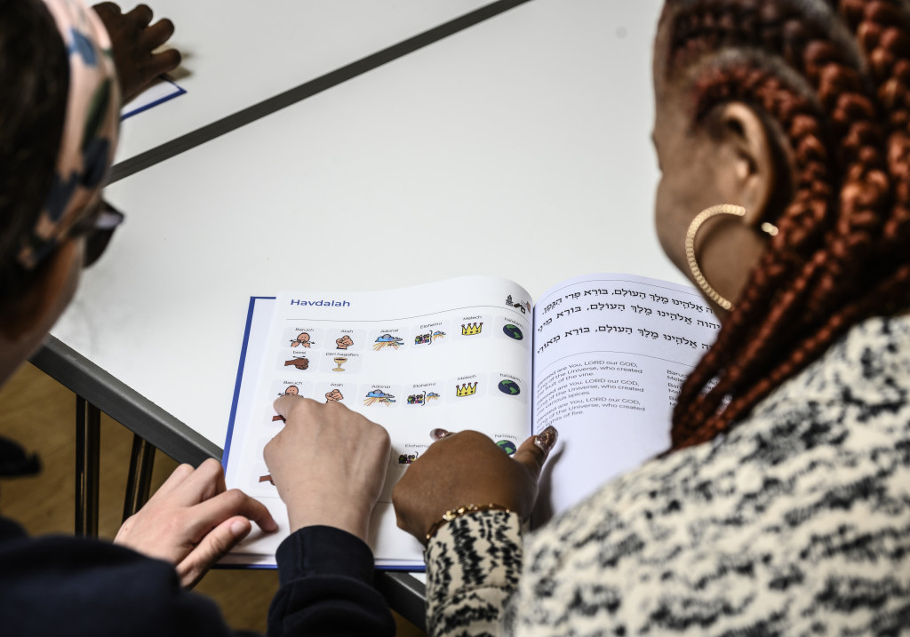 New_Siddur_Lakol_being_used_by_Kisharon_Noe_pupil_Salome_and_her_Support_Worker_Necola_Picture_Credit_Robert_Shack.jpeg